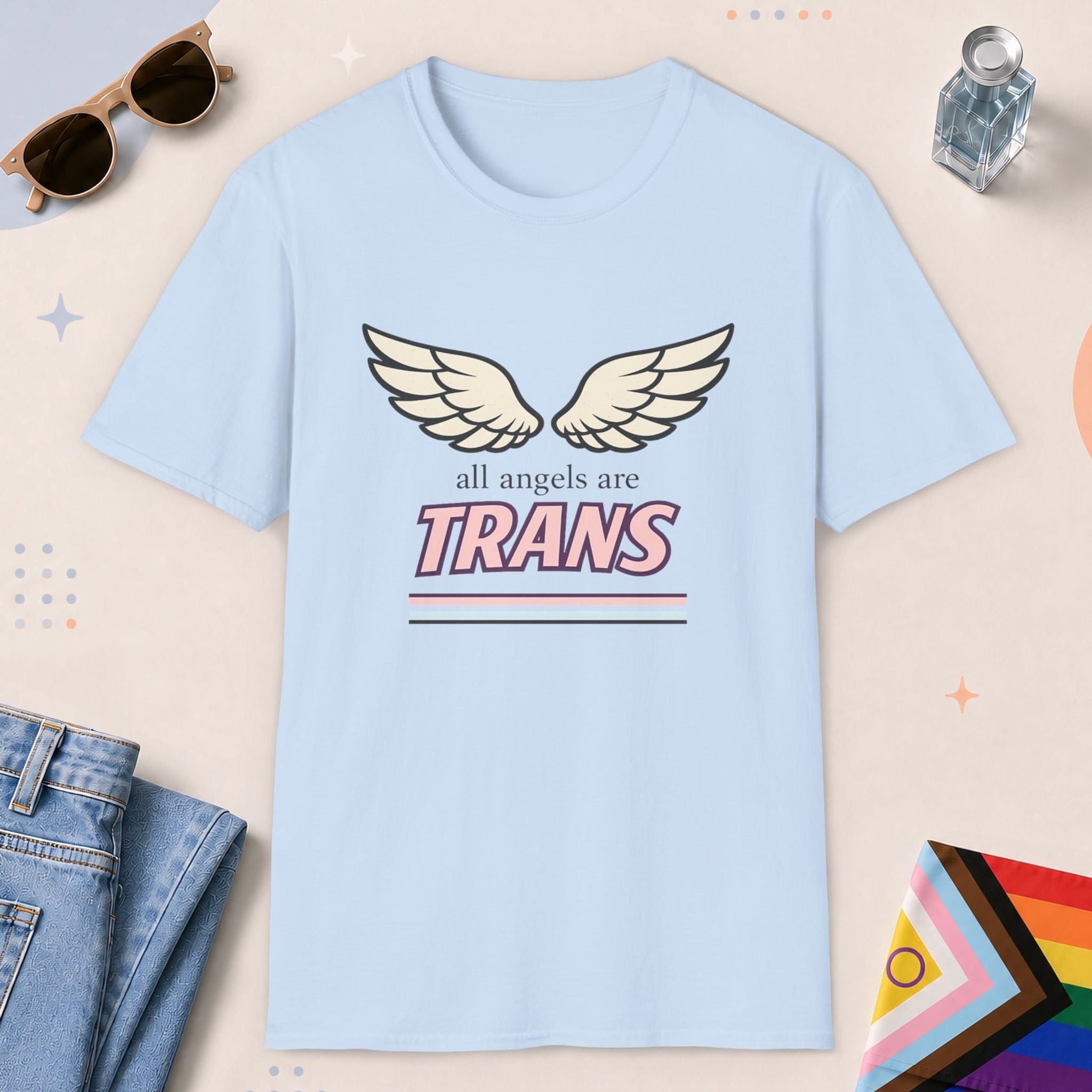 Light Blue color all-gender graphic t-shirt with "All Angels Are Trans" design