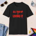 Black color all-gender graphic t-shirt with "All Tied Up" design