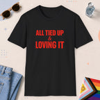 Black color all-gender graphic t-shirt with "All Tied Up" design