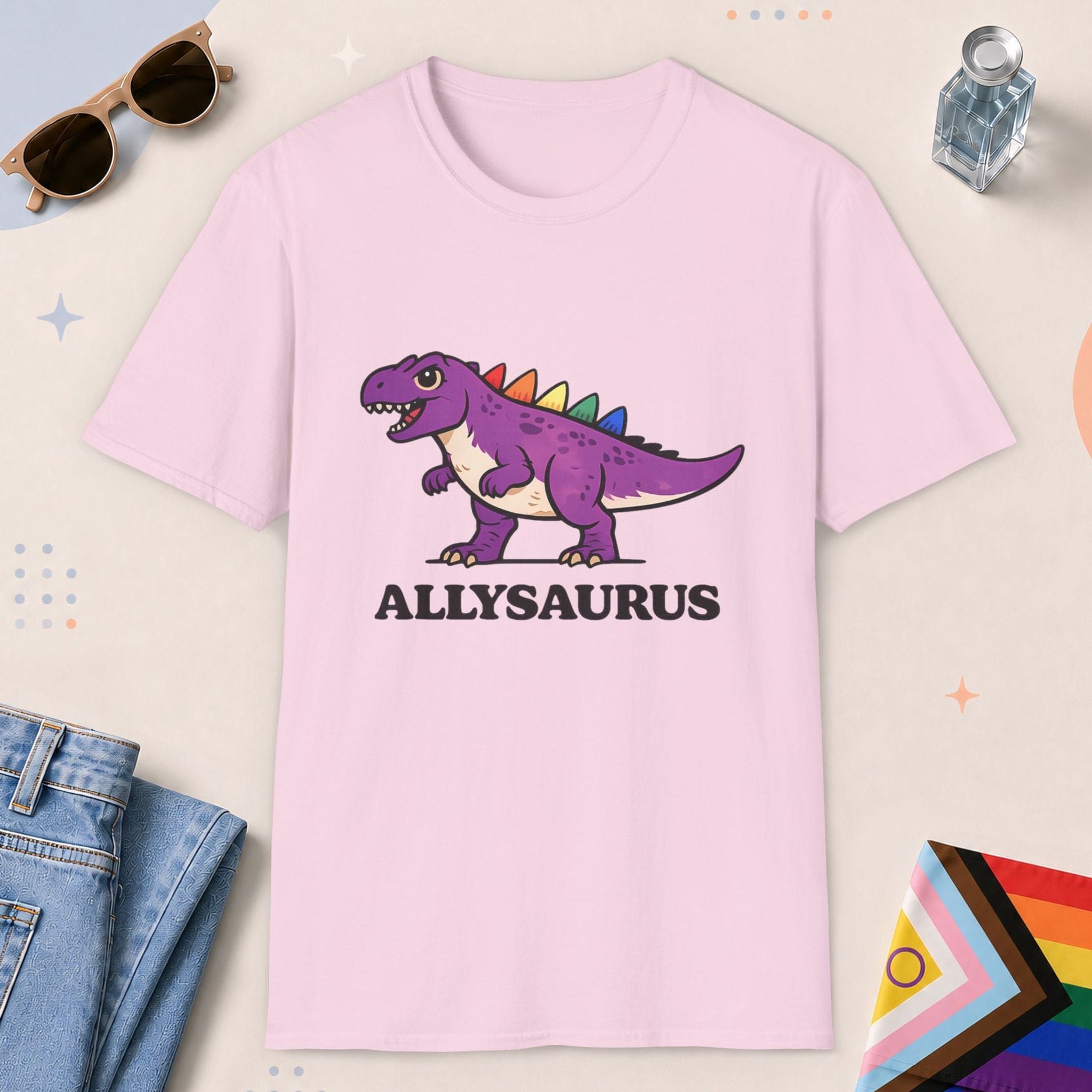 Light Pink color all-gender graphic t-shirt with "Allysaurus" design