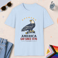 Light Blue color all-gender graphic t-shirt with "America Gay Since 1776" design