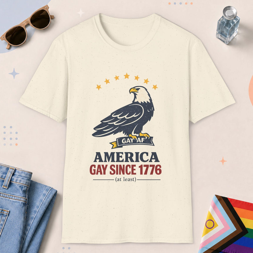Natural color all-gender graphic t-shirt with "America Gay Since 1776" design