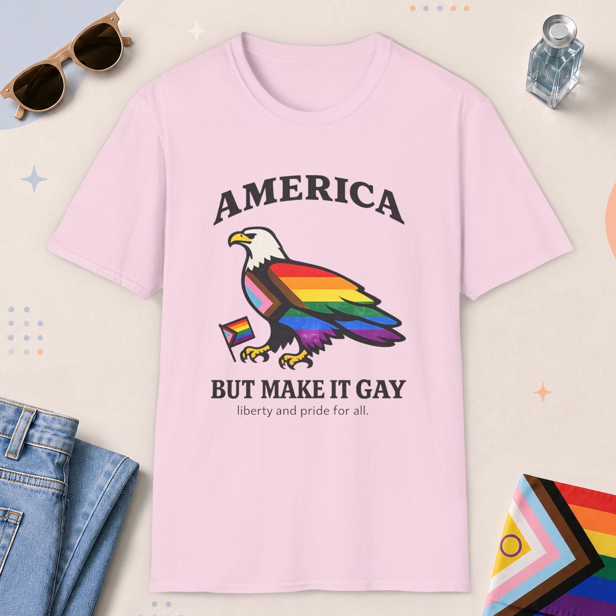 Light Pink color all-gender graphic t-shirt with "America Make It Gay" design