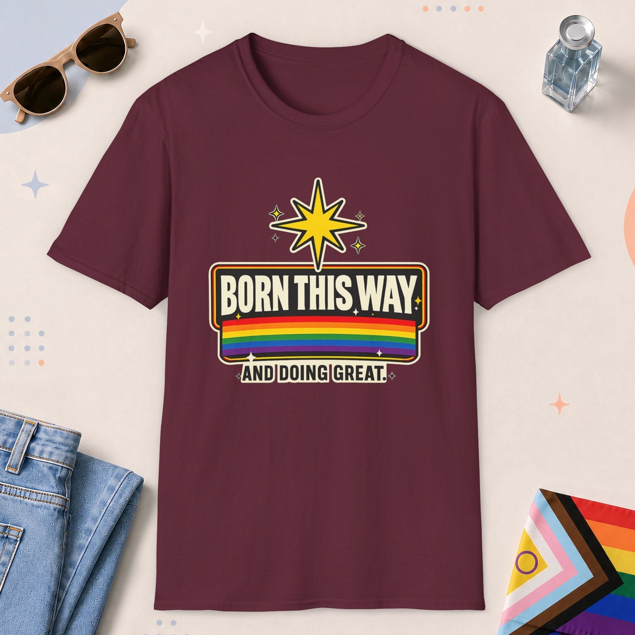 Maroon color all-gender graphic t-shirt with "Born This Way" design