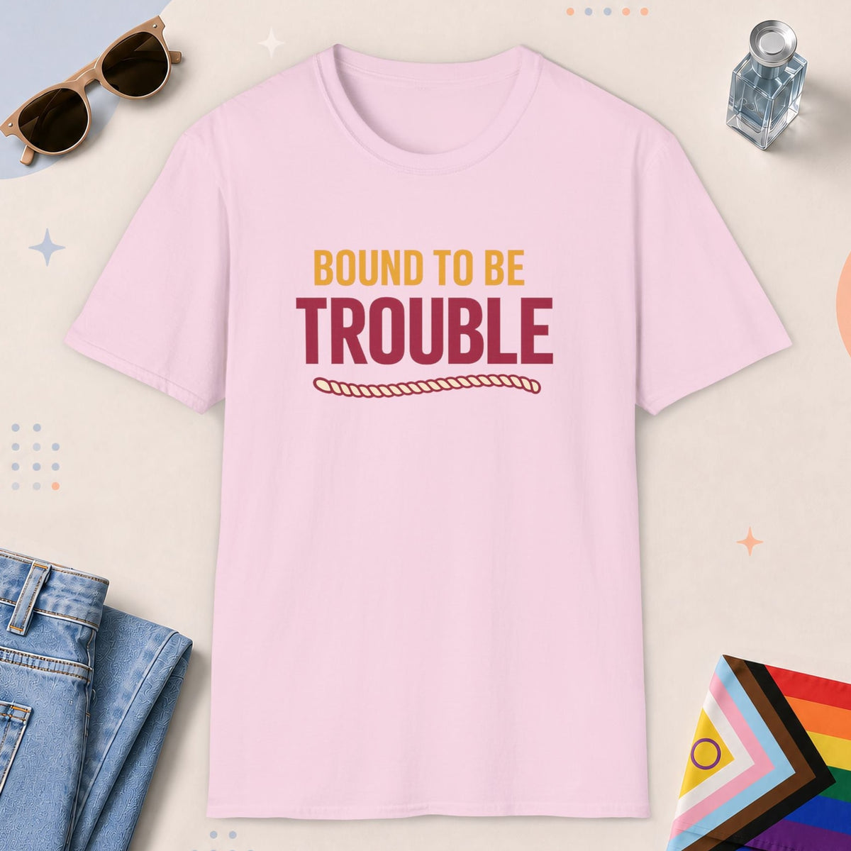 Light Pink color all-gender graphic t-shirt with "Bound To Trouble" design