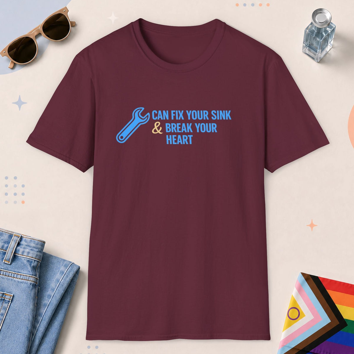 Maroon color all-gender graphic t-shirt with "Fix Your Sink" design