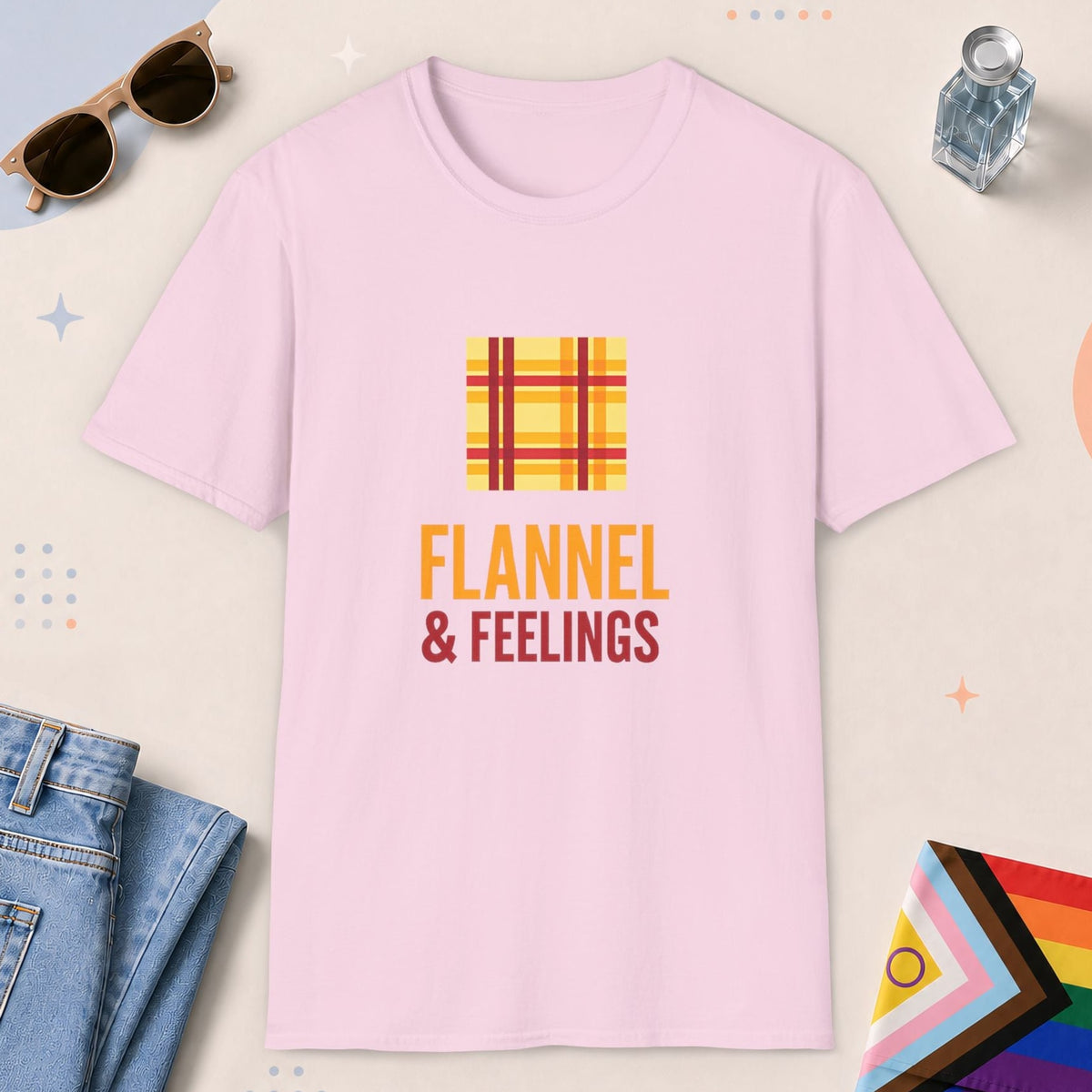 Light Pink color all-gender graphic t-shirt with "Flannel & Feelings" design