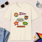Natural color all-gender graphic t-shirt with "Gay Badges" design