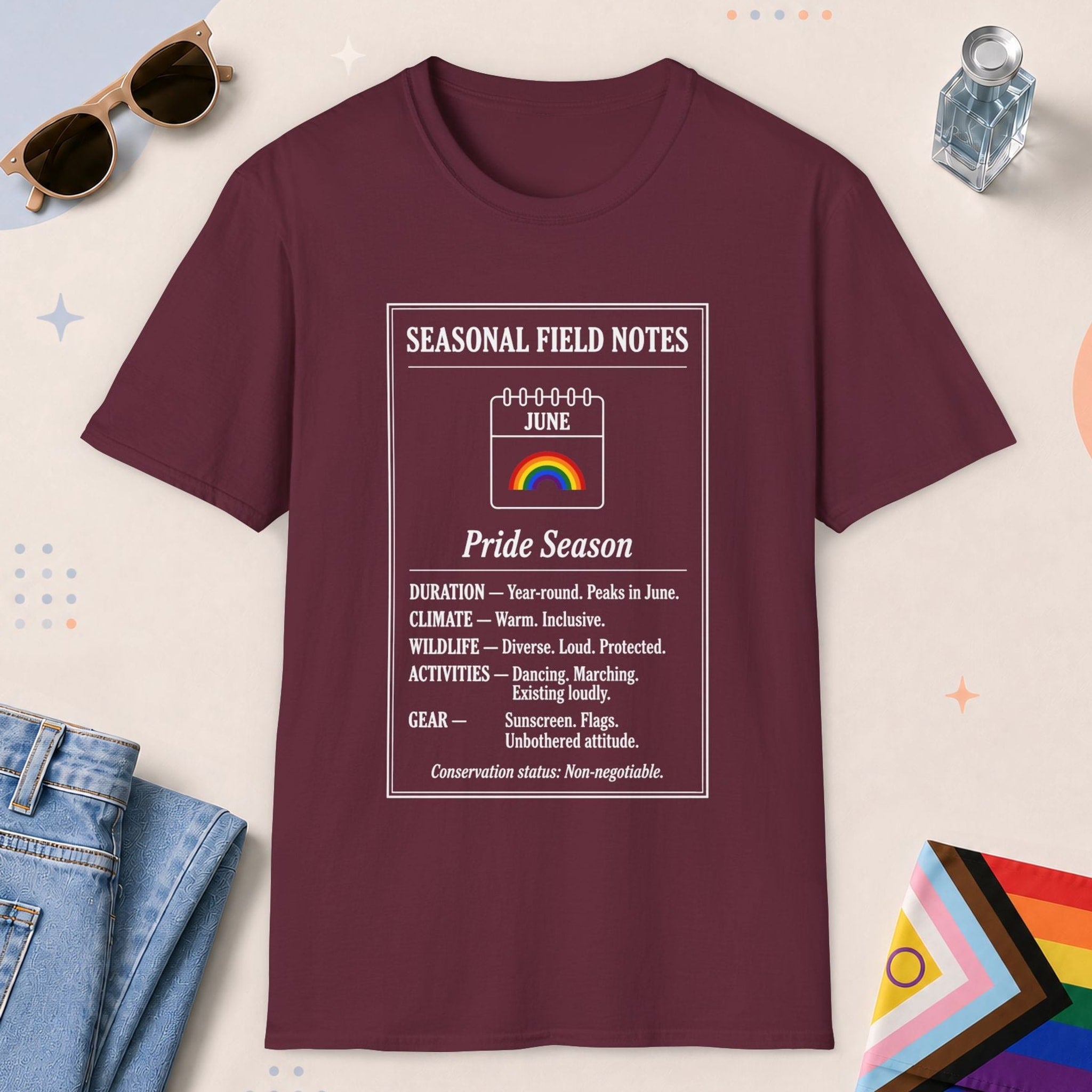 Maroon color all-gender graphic t-shirt with "June Field Notes" design