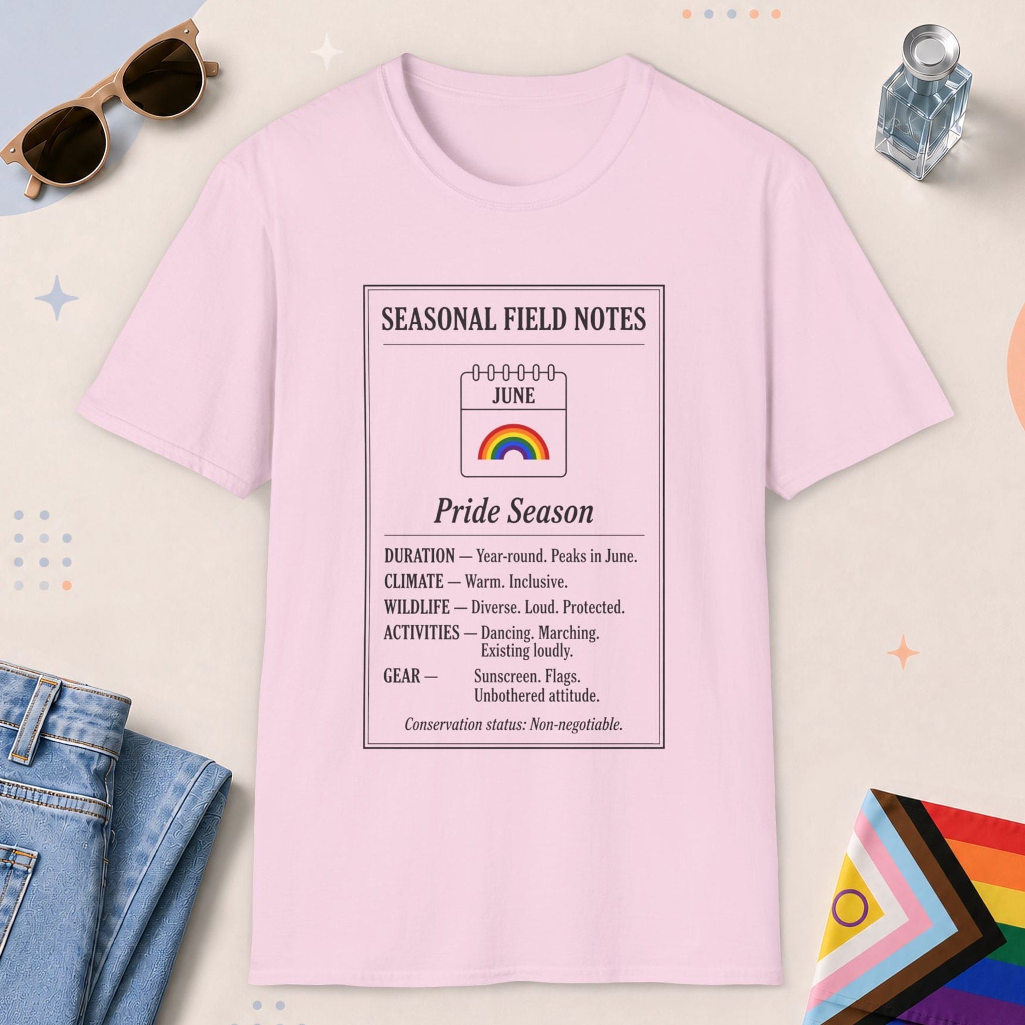 Light Pink color all-gender graphic t-shirt with "June Field Notes" design