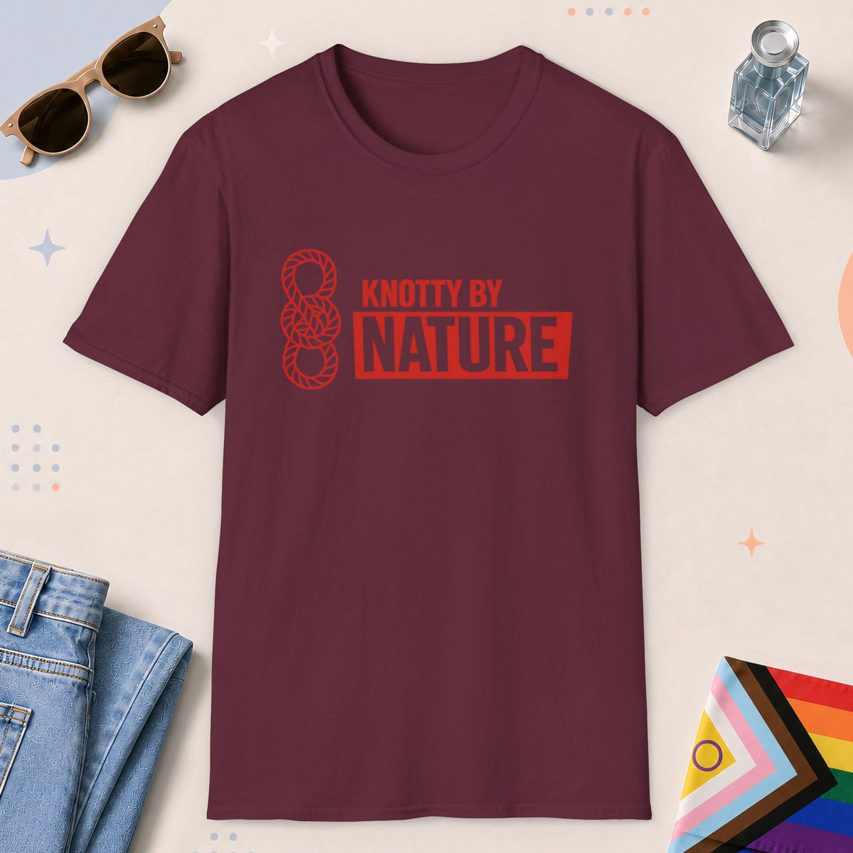 Maroon color all-gender graphic t-shirt with "Knotty By Nature" design