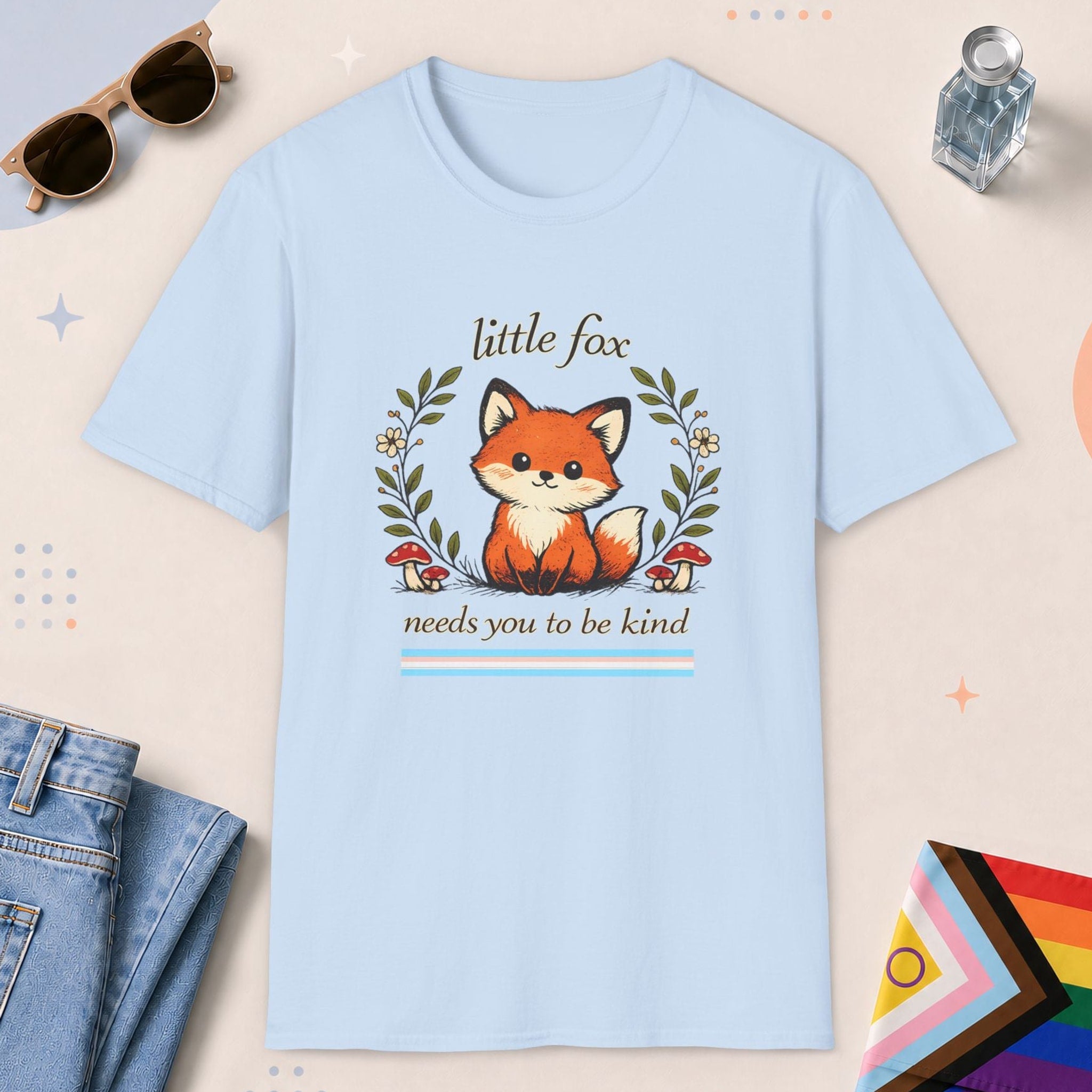 Light Blue color all-gender graphic t-shirt with "Little Fox Kind" design