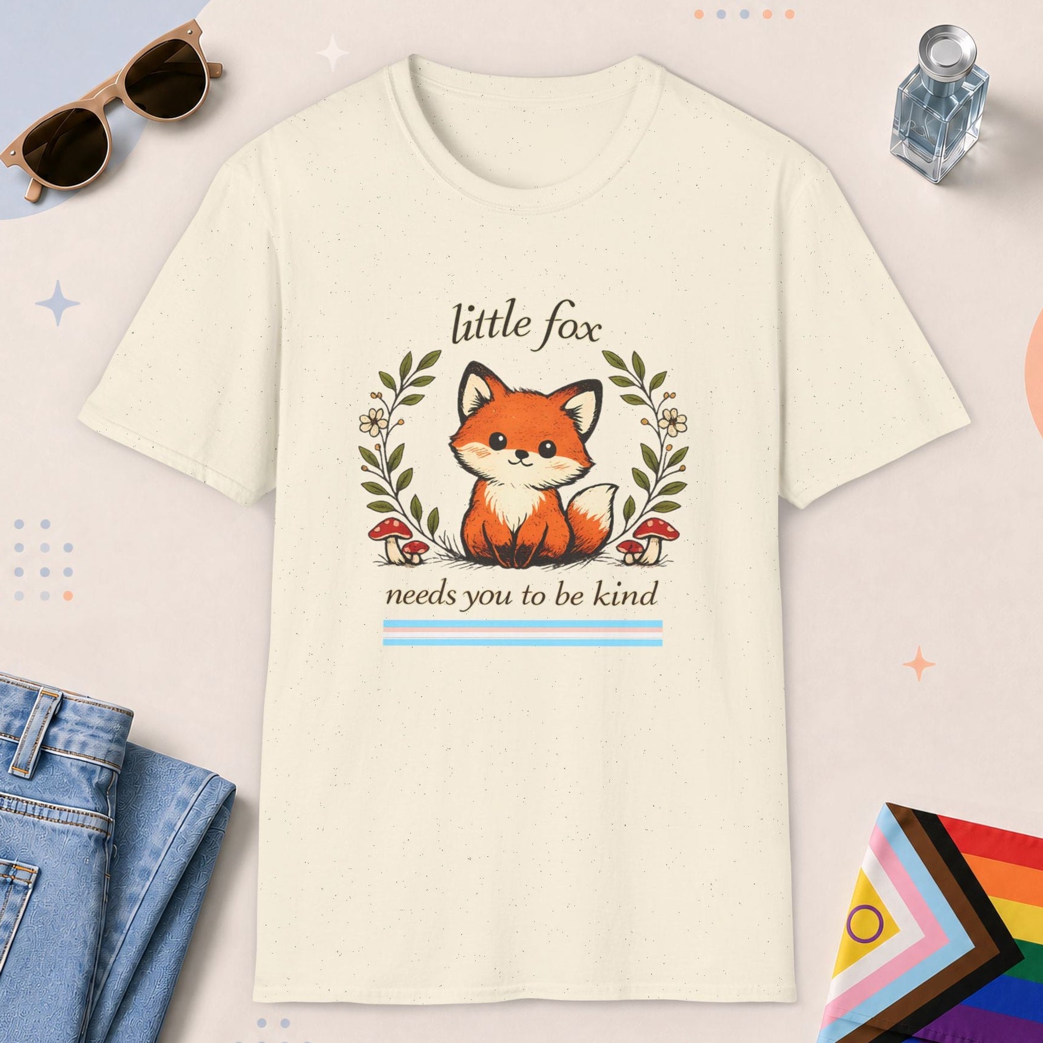 Natural color all-gender graphic t-shirt with "Little Fox Kind" design