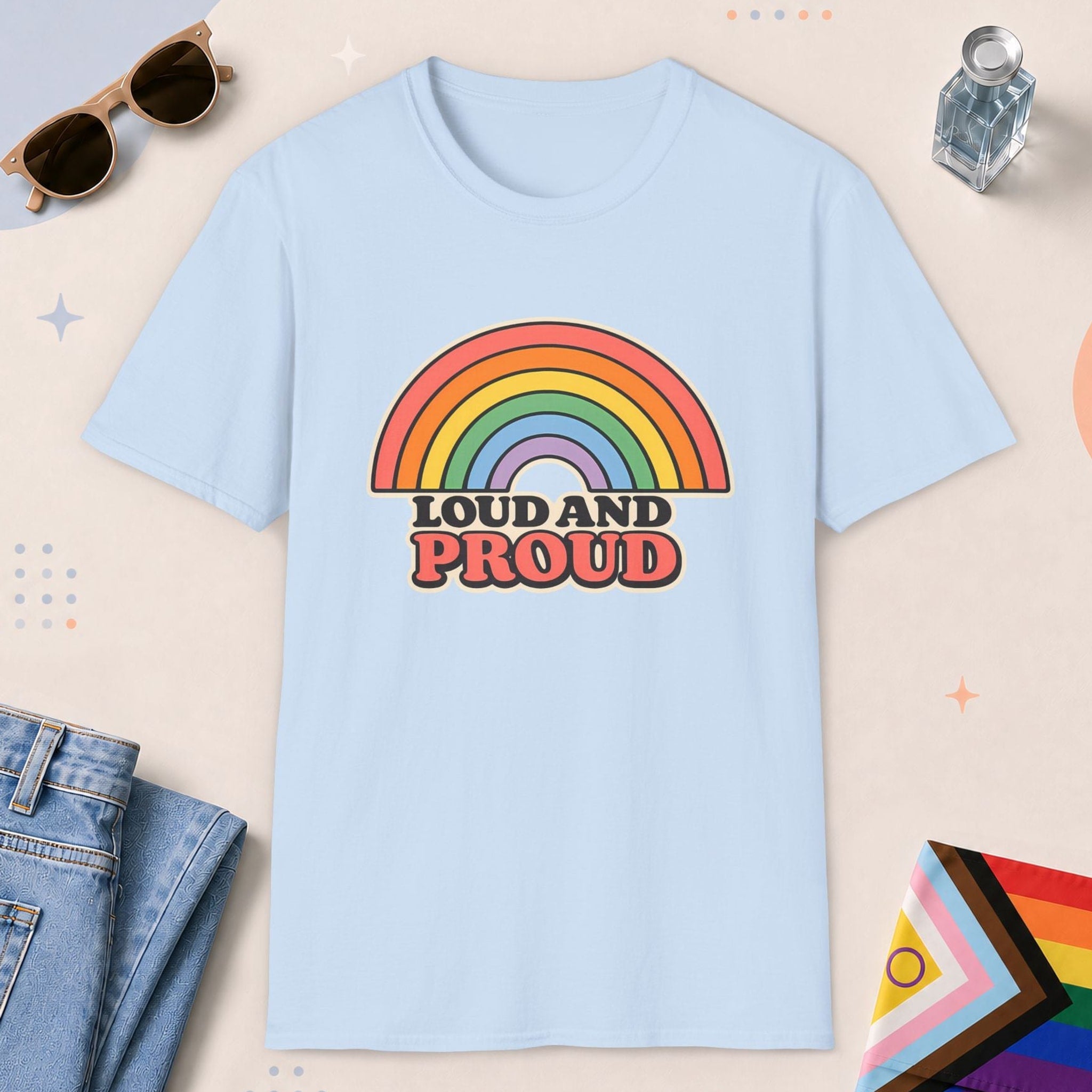 Light Blue color all-gender graphic t-shirt with "Loud And Proud" design