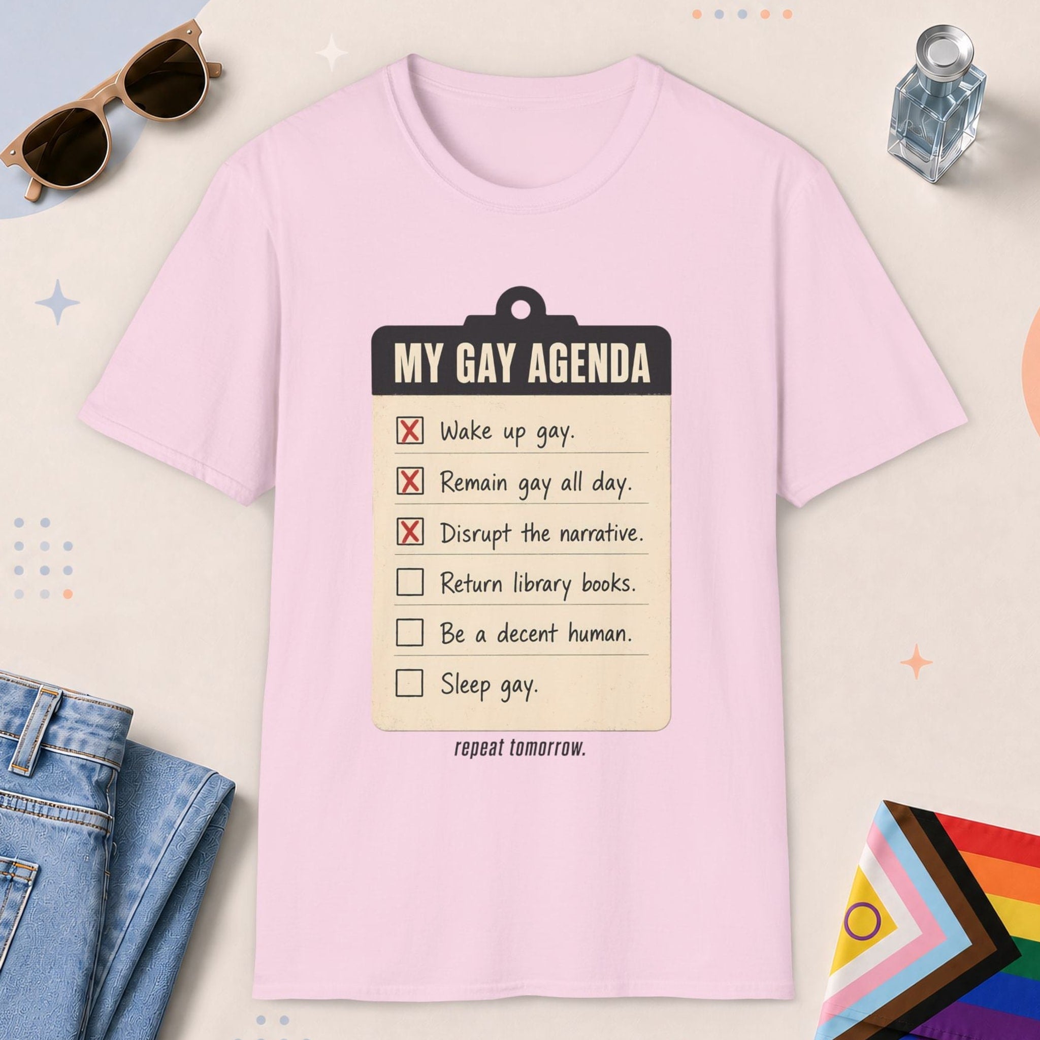 Light Pink color all-gender graphic t-shirt with "My Gay Agenda" design