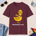 Maroon color all-gender graphic t-shirt with "Obviously Gay Duck" design