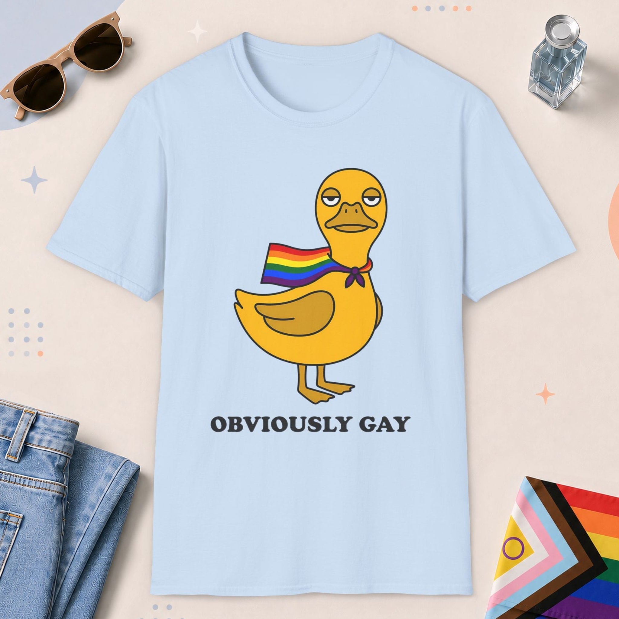 Light Blue color all-gender graphic t-shirt with "Obviously Gay Duck" design
