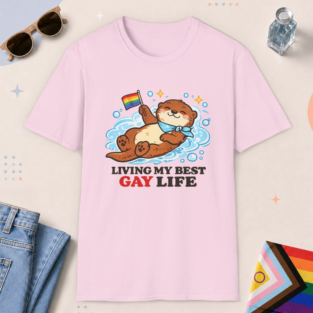Light Pink color all-gender graphic t-shirt with "Otter Living Best Gay Life" design