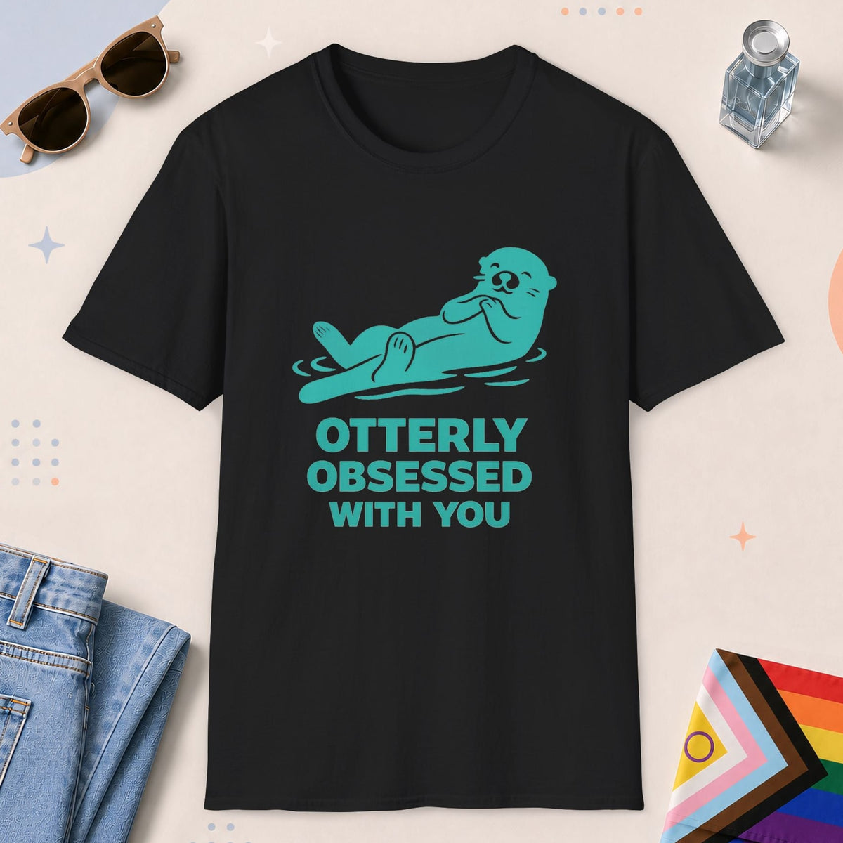 Black color all-gender graphic t-shirt with "Otterly Obsessed" design