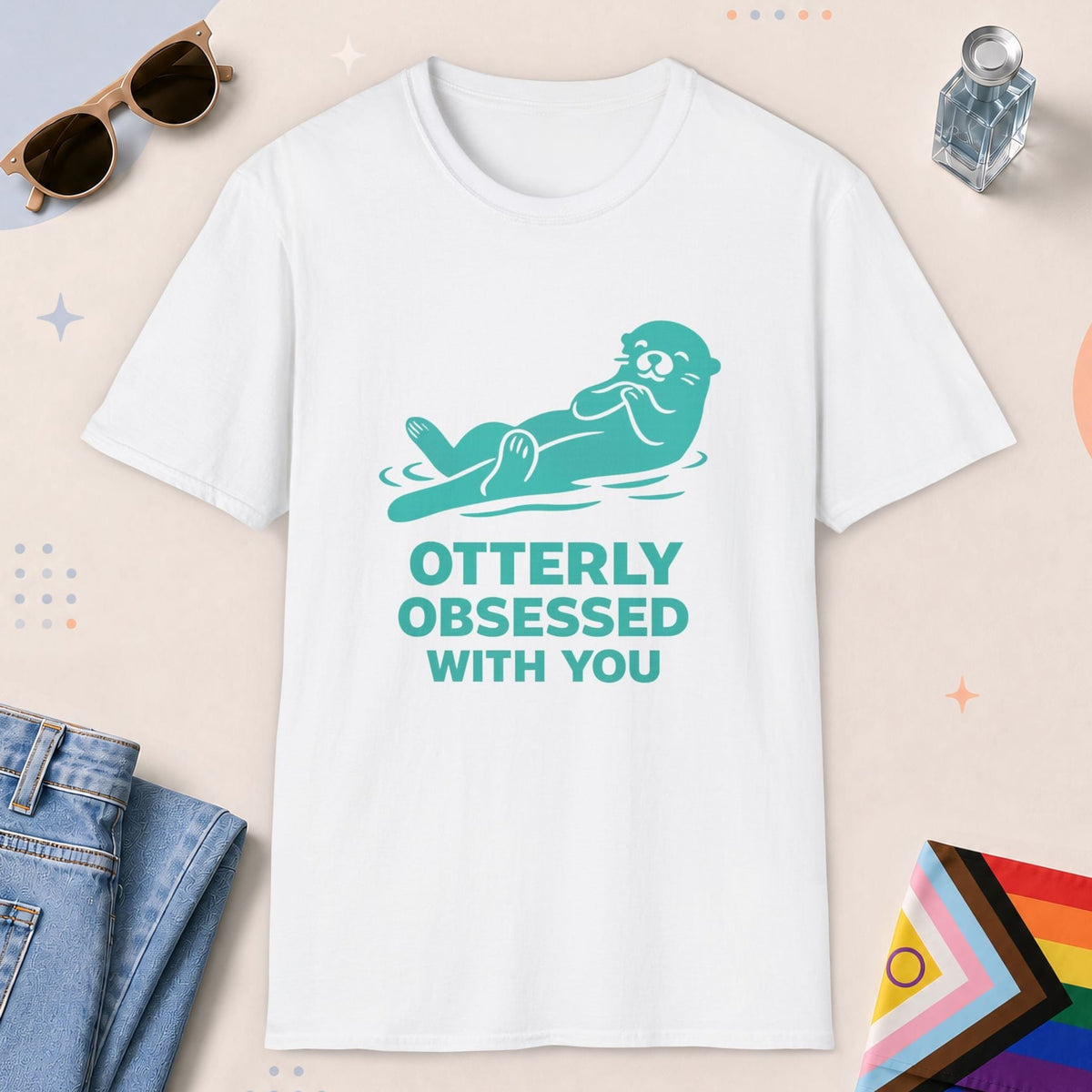 White color all-gender graphic t-shirt with "Otterly Obsessed" design