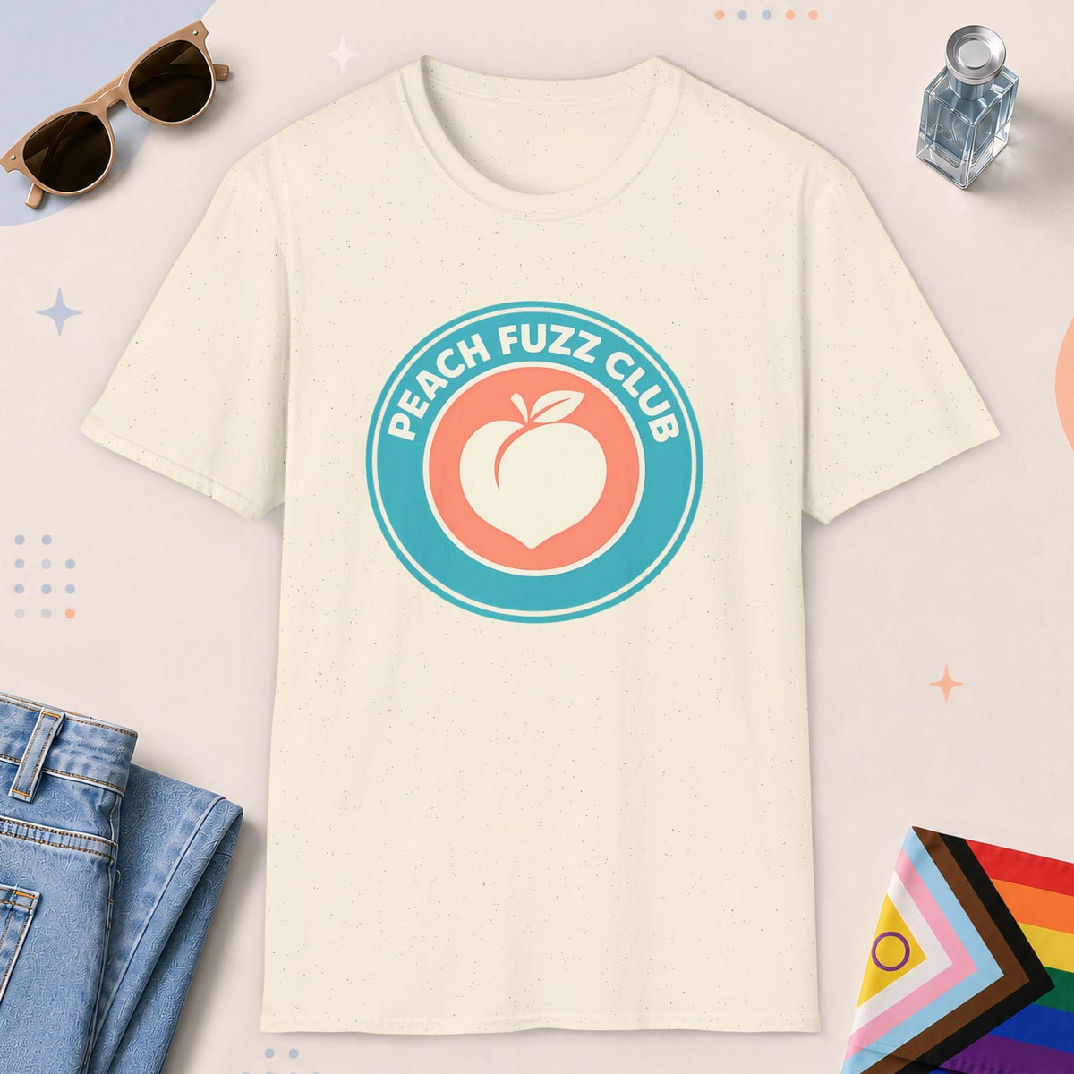 Natural color all-gender graphic t-shirt with "Peach Fuzz Club" design