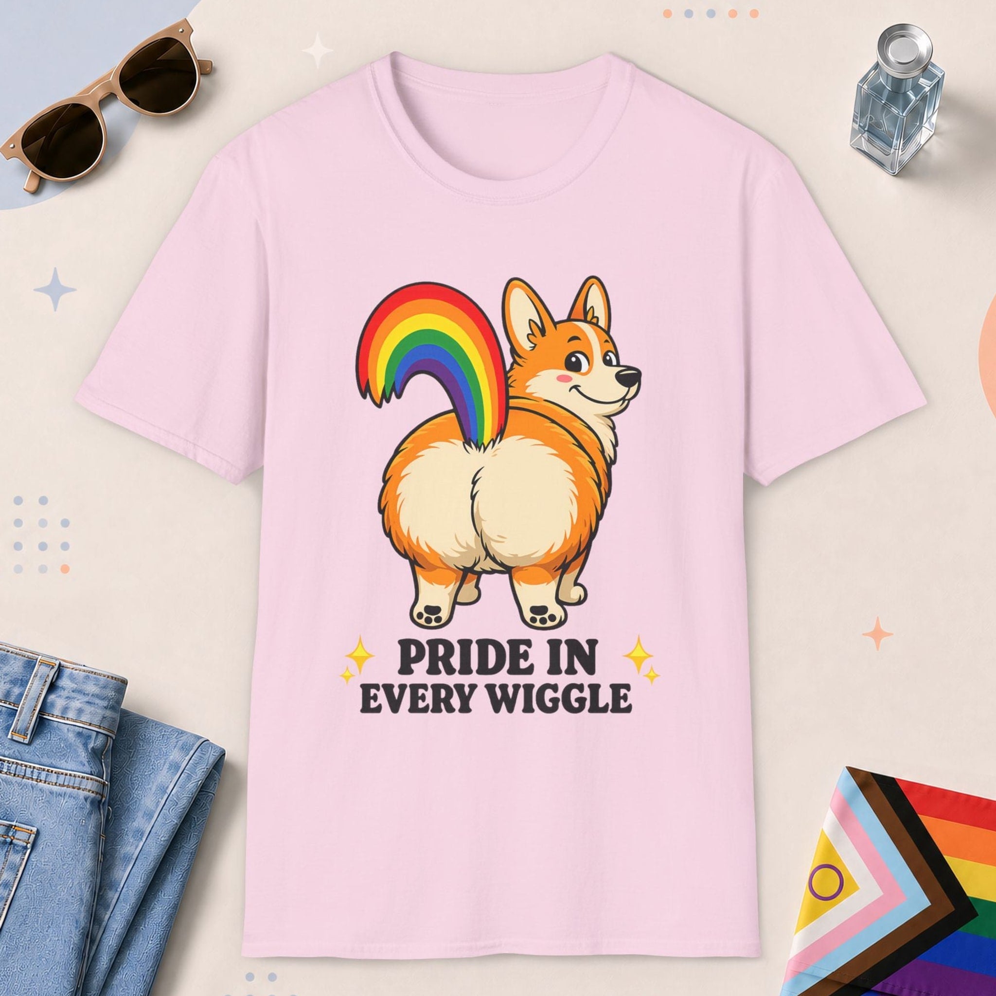Light Pink color all-gender graphic t-shirt with "Pride In Every Wiggle" design