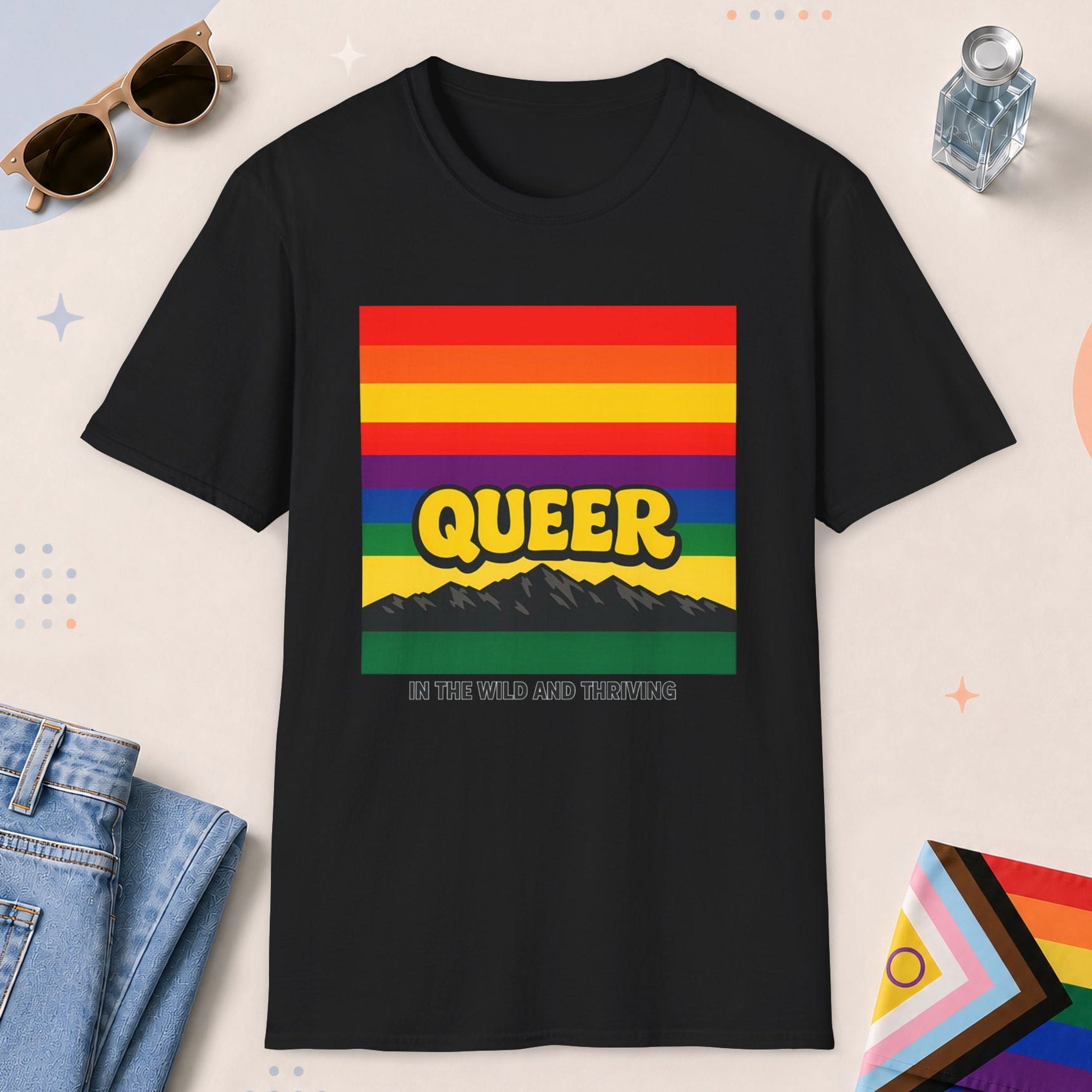 Black color all-gender graphic t-shirt with "Queer In The Wild" design