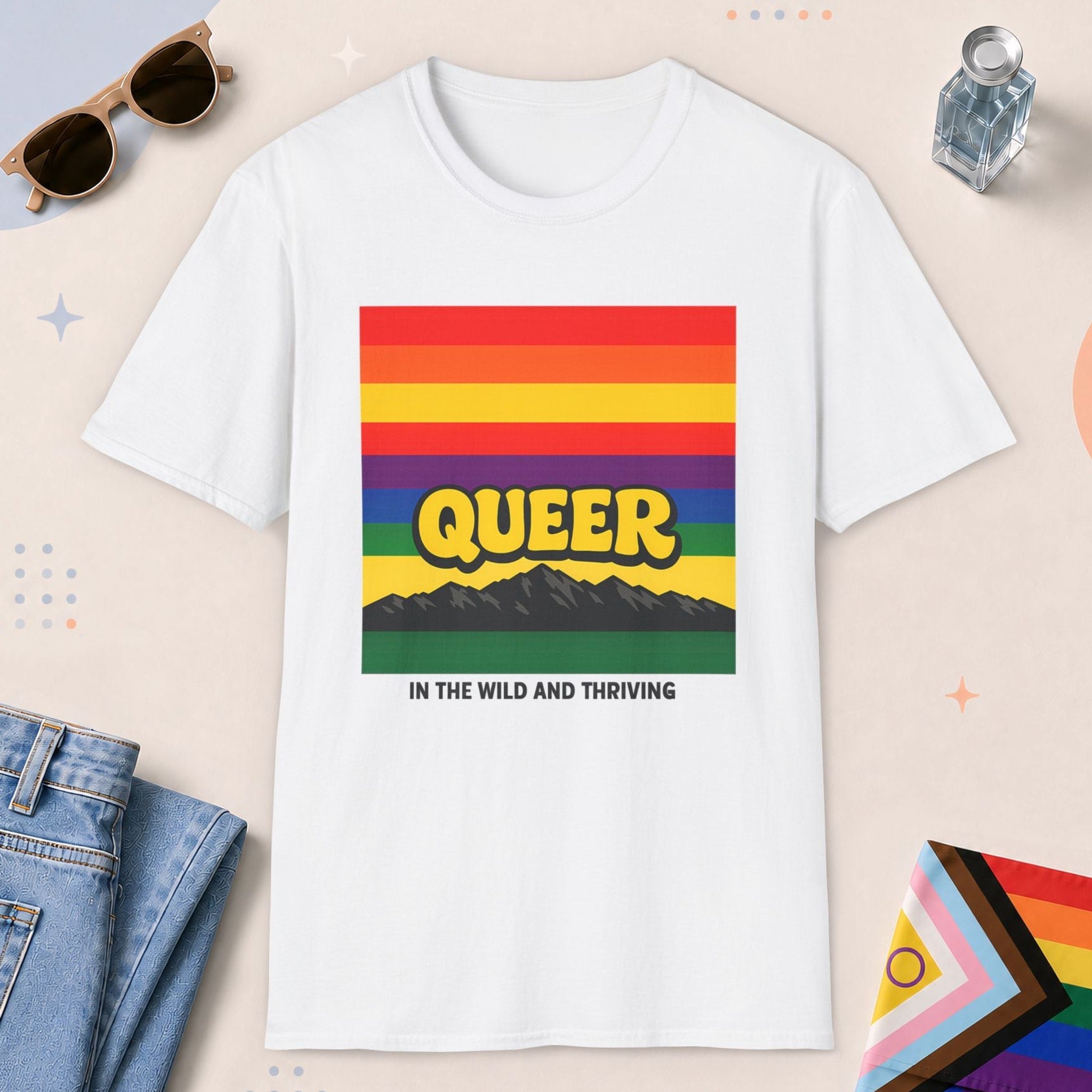 White color all-gender graphic t-shirt with "Queer In The Wild" design