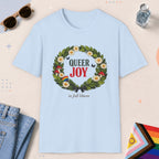 Light Blue color all-gender graphic t-shirt with "Queer Joy" design