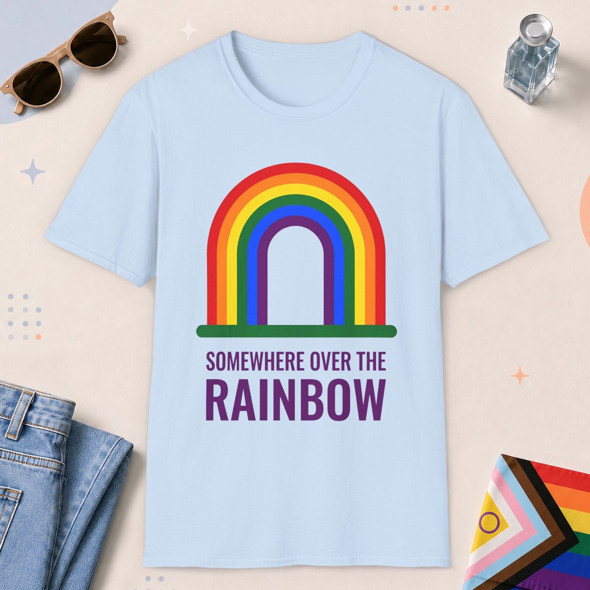 Light Blue color all-gender graphic t-shirt with "somewhere over the rainbow" design