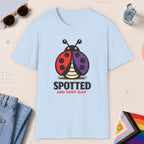 Light Blue color all-gender graphic t-shirt with "Spotted Very Gay" design