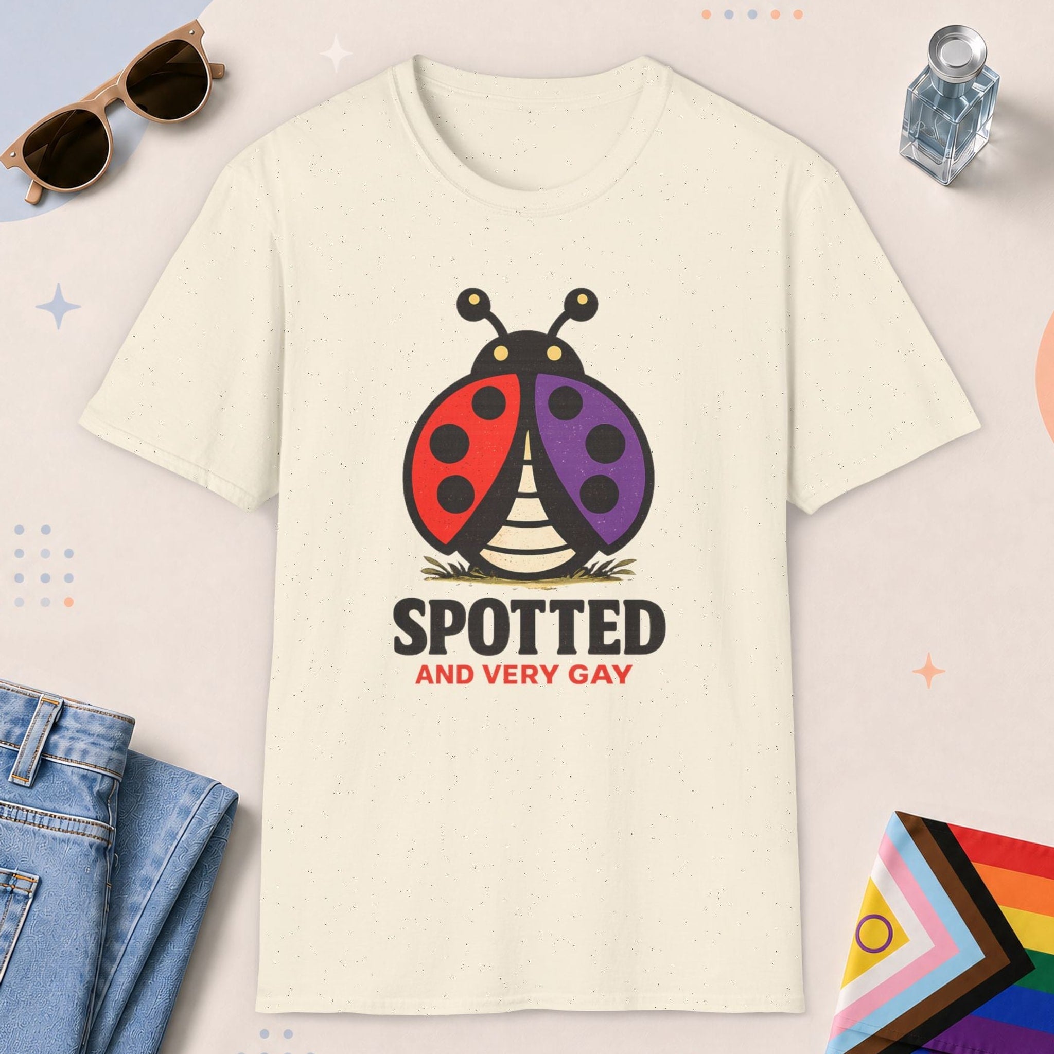 Natural color all-gender graphic t-shirt with "Spotted Very Gay" design