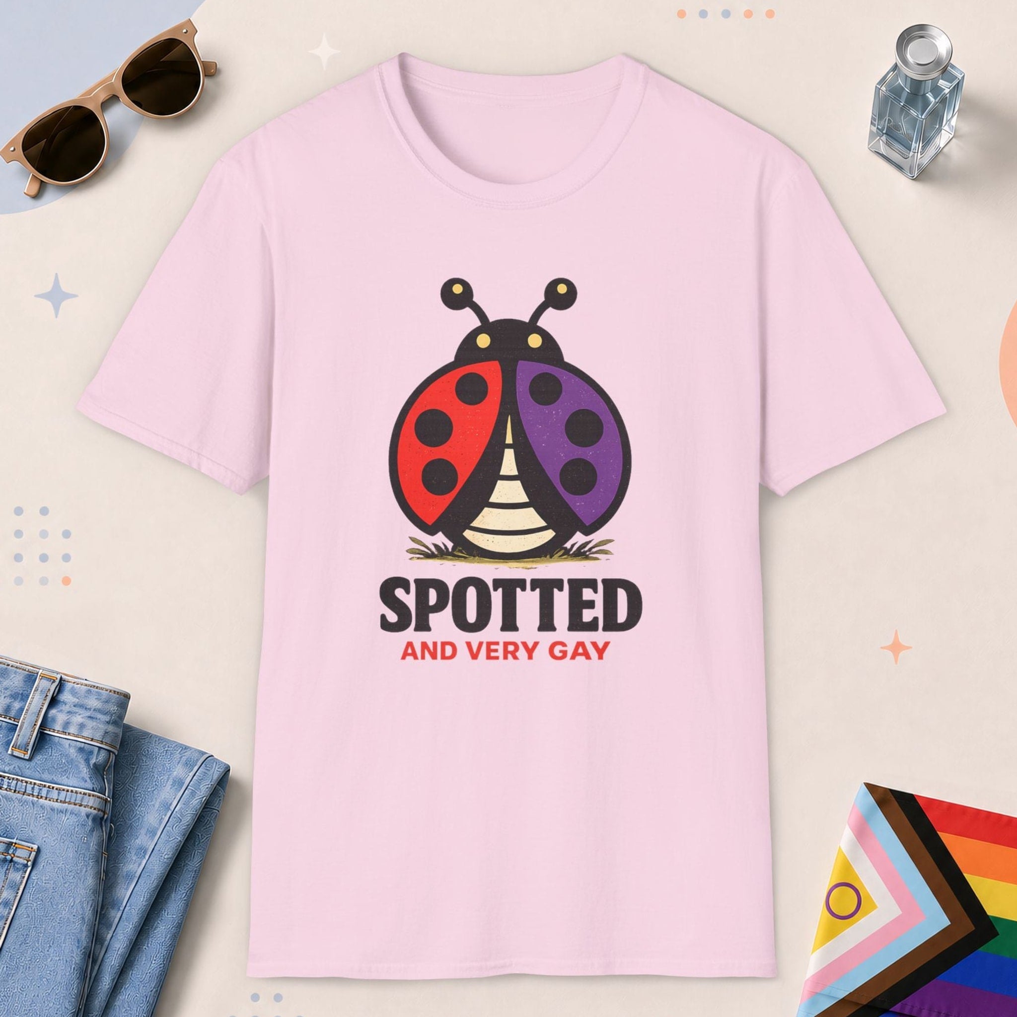 Light Pink color all-gender graphic t-shirt with "Spotted Very Gay" design
