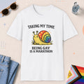 White color all-gender graphic t-shirt with "Taking My Time Snail" design