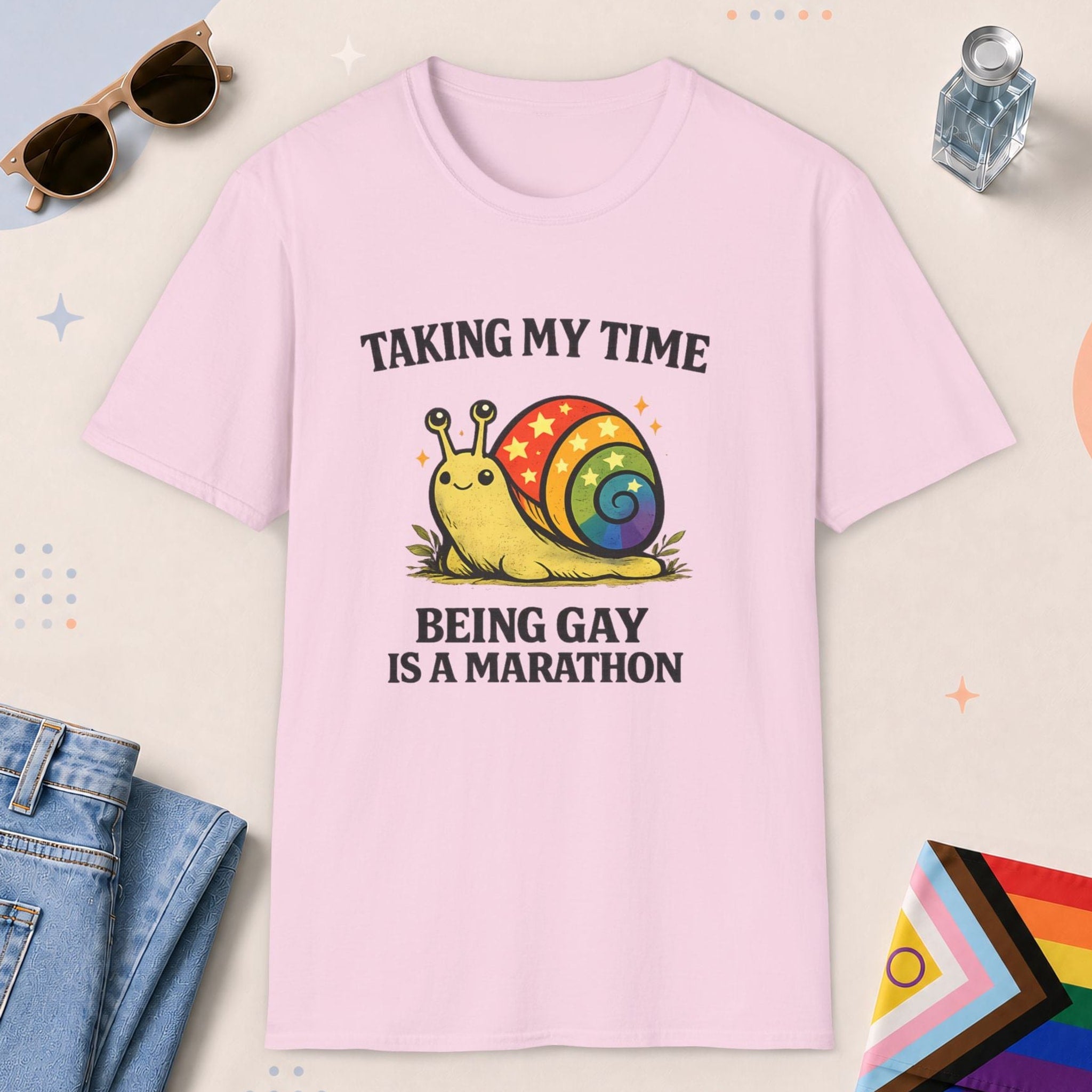 Light Pink color all-gender graphic t-shirt with "Taking My Time Snail" design
