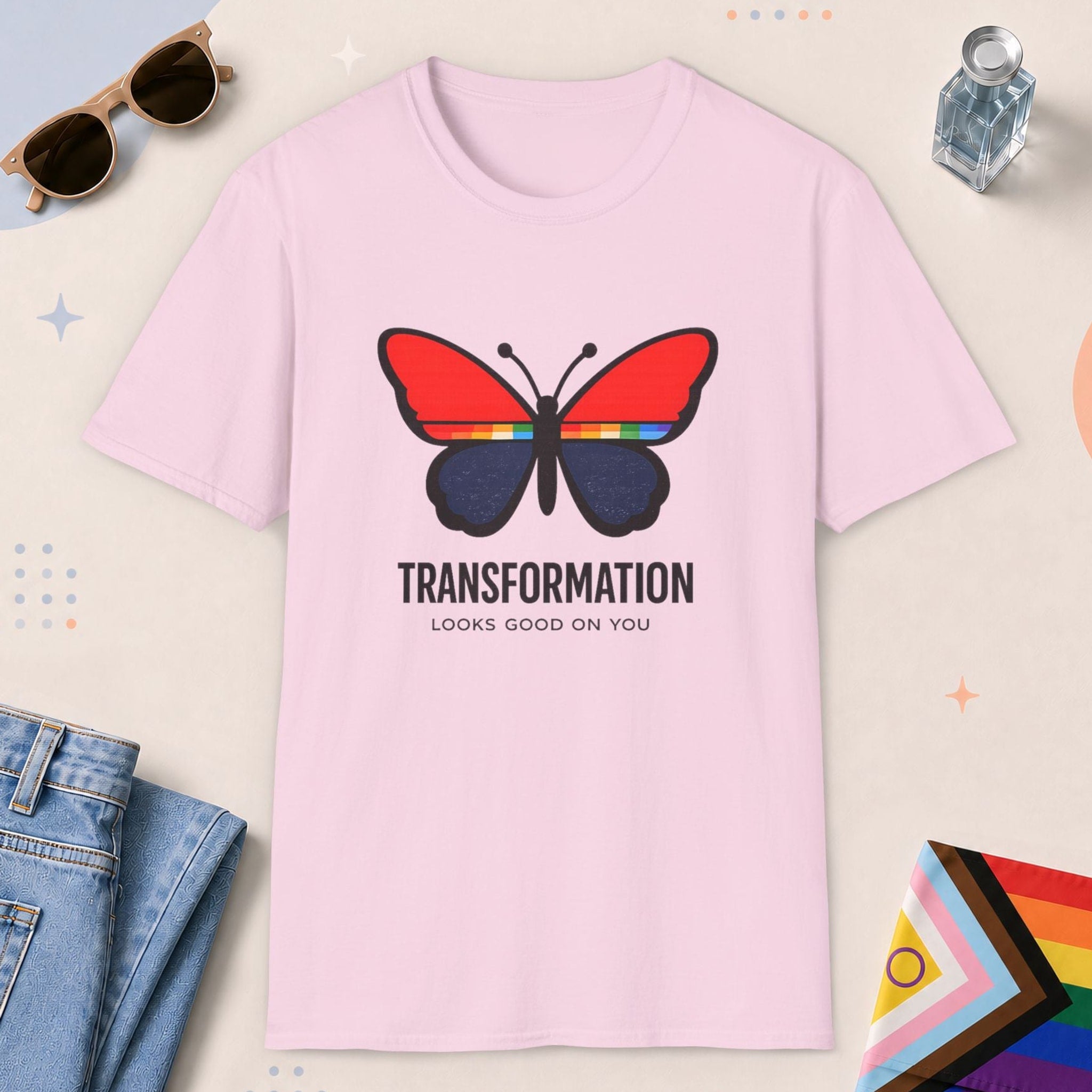 Light Pink color all-gender graphic t-shirt with "Transformation Looks Good" design