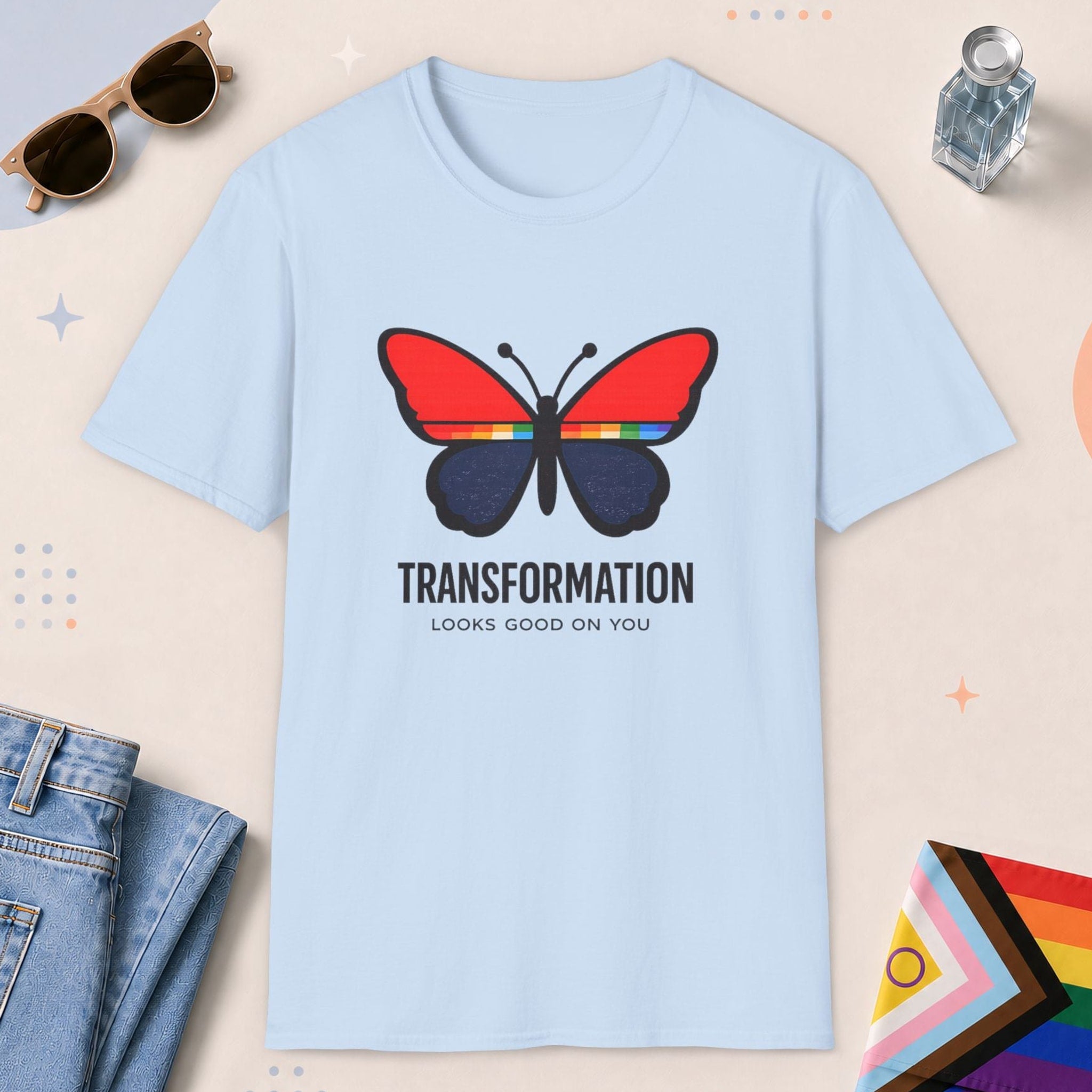 Light Blue color all-gender graphic t-shirt with "Transformation Looks Good" design
