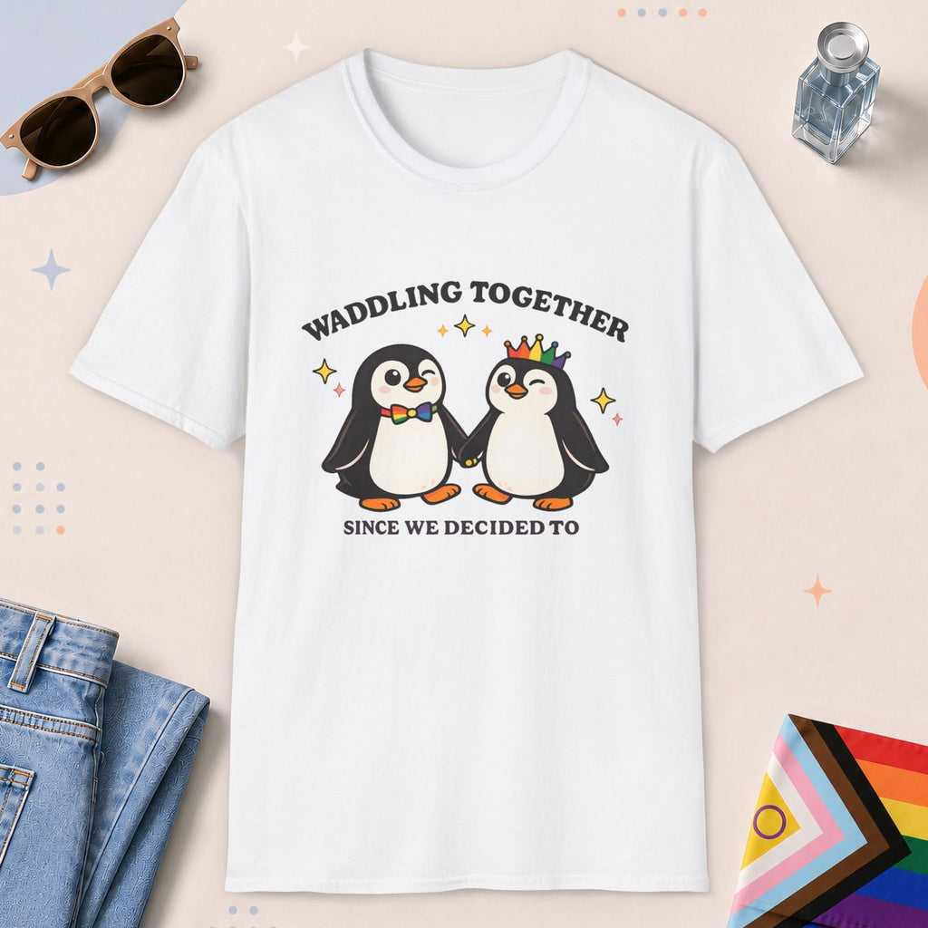 White color all-gender graphic t-shirt with "Waddling Together" design