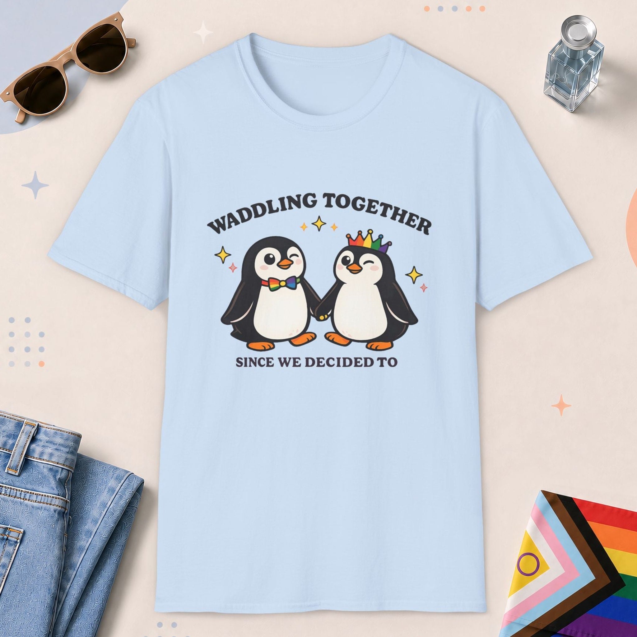 Light Blue color all-gender graphic t-shirt with "Waddling Together" design