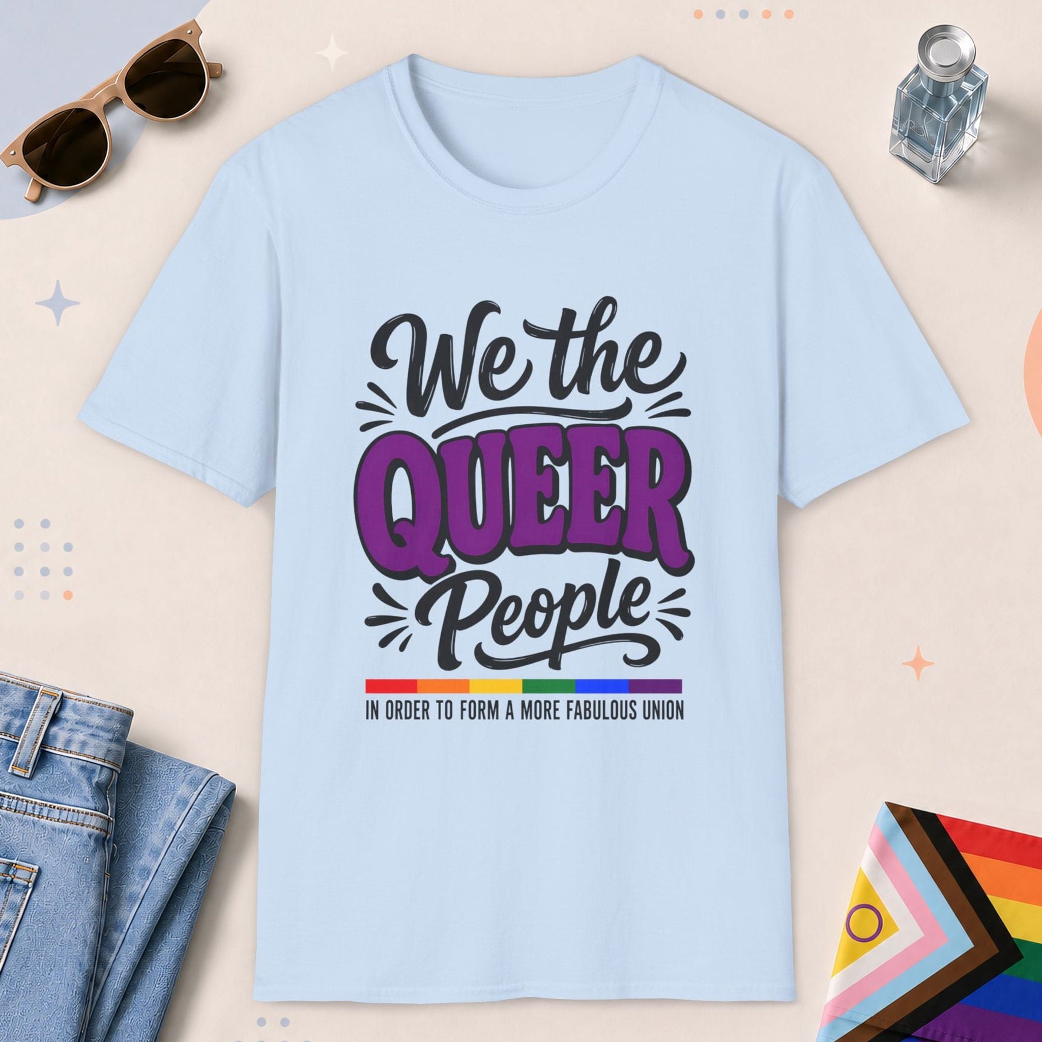 Light Blue color all-gender graphic t-shirt with "We The Queer People" design