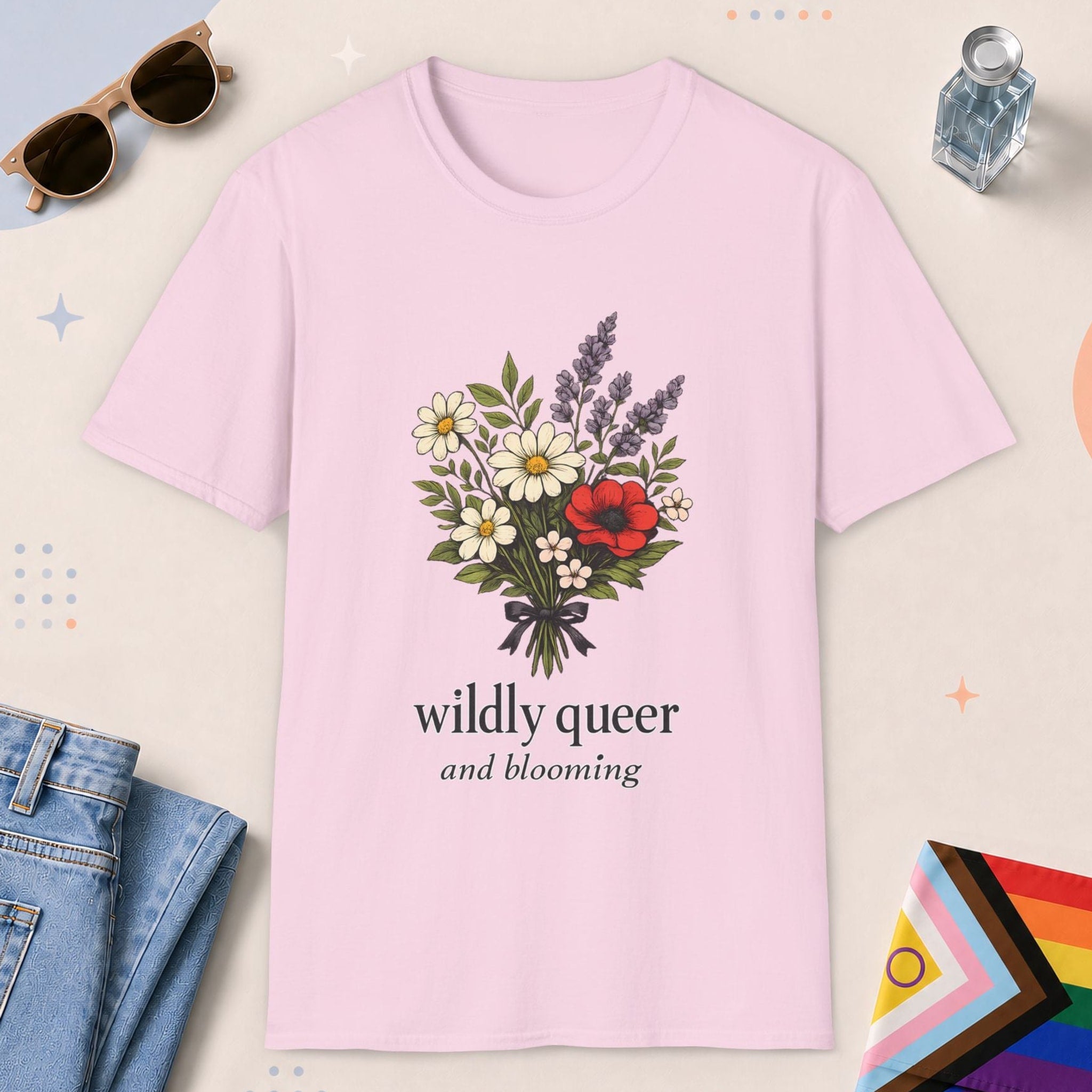 Light Pink color all-gender graphic t-shirt with "Wildly Queer" design
