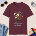 Maroon color all-gender graphic t-shirt with "Wildly Queer" design