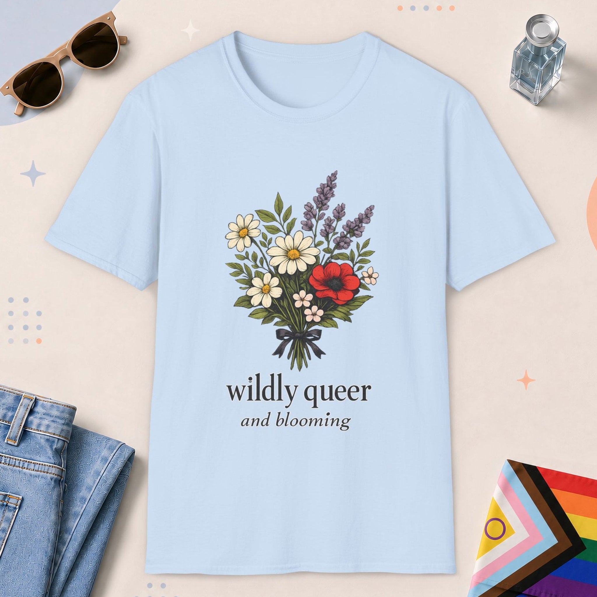Light Blue color all-gender graphic t-shirt with "Wildly Queer" design
